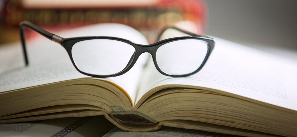 book with glasses by Inc.